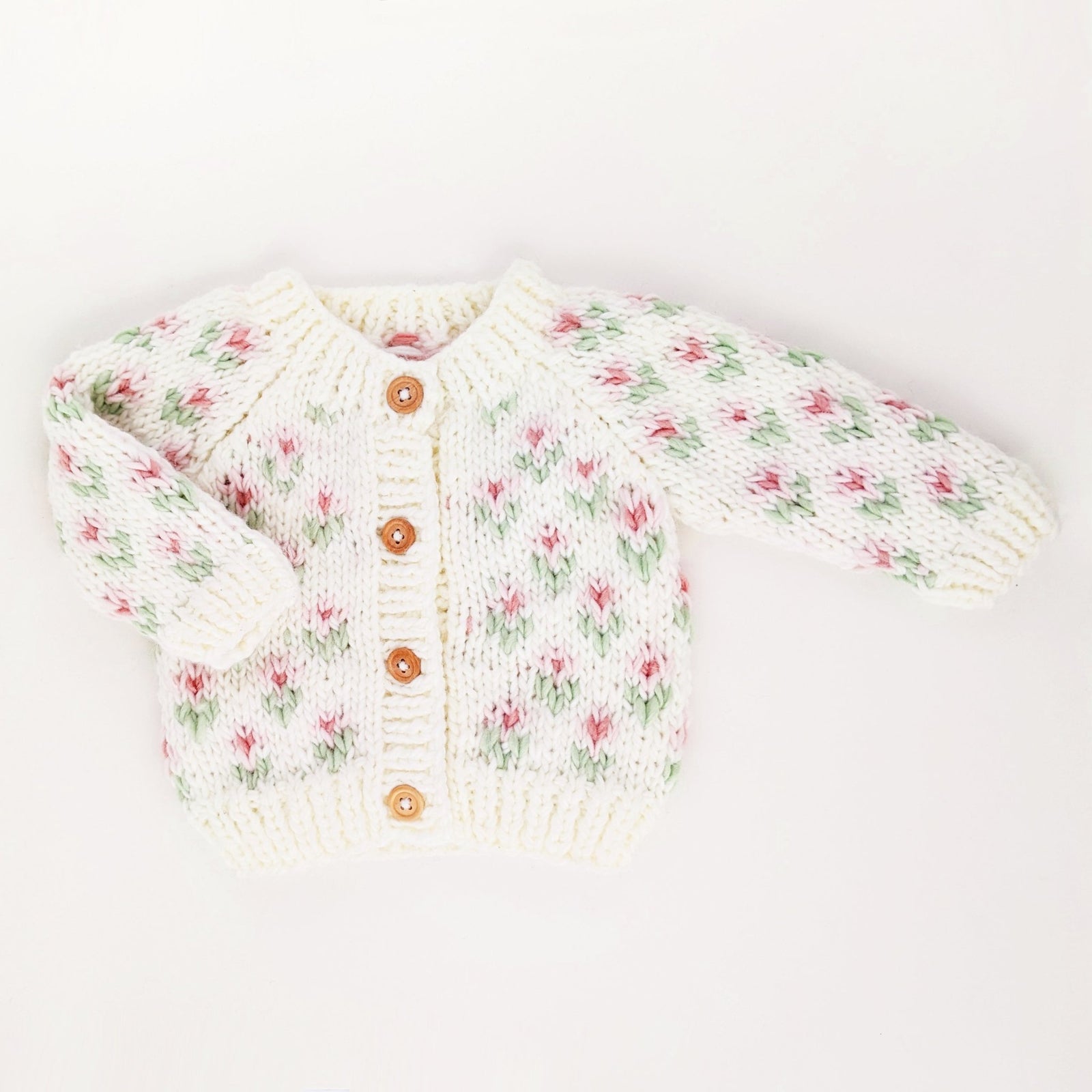 Bitty Blooms white hand knit baby cardigan sweater with pink flowers