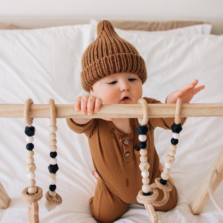 Knitted hat with peak deals